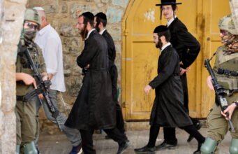 Hampir 100 anggota parlemen Inggris dan rekan-rekannya menyerukan pembatalan acara pemukiman Israel