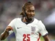 Mengapa Djed Spence dari Inggris menggunakan masker pelindung saat pertandingan Piala Dunia 2026 melawan Ghana?