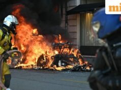 Tesla dibakar dan jendela-jendela bank dipecahkan di Jenewa ketika para demonstran berkumpul untuk memprotes KTT G7 di Prancis