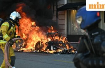 Tesla dibakar dan jendela-jendela bank dipecahkan di Jenewa ketika para demonstran berkumpul untuk memprotes KTT G7 di Prancis