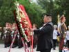 Kim dari Korea Utara mengunjungi kuburan perang pada peringatan gencatan senjata Perang Korea